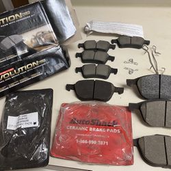 Ford Escape 2015 Ceramic Disc Brake Pads and two Rotors for a 2015 Ford Escape  