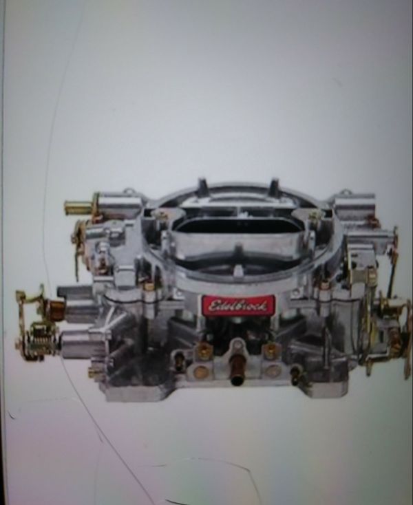 1406 edelbrock carburetor with spacer tower 1" high 600 cfm 4 barrel