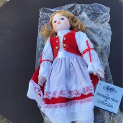 New Porcelain Doll In It’s Box Very Pretty