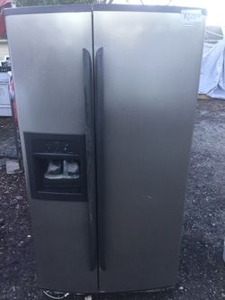 Kenmore black and stainless side by side/ 90 day warranty/ delivery and installation are available