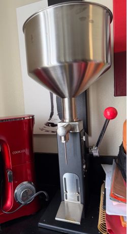 Liquid filling machine.