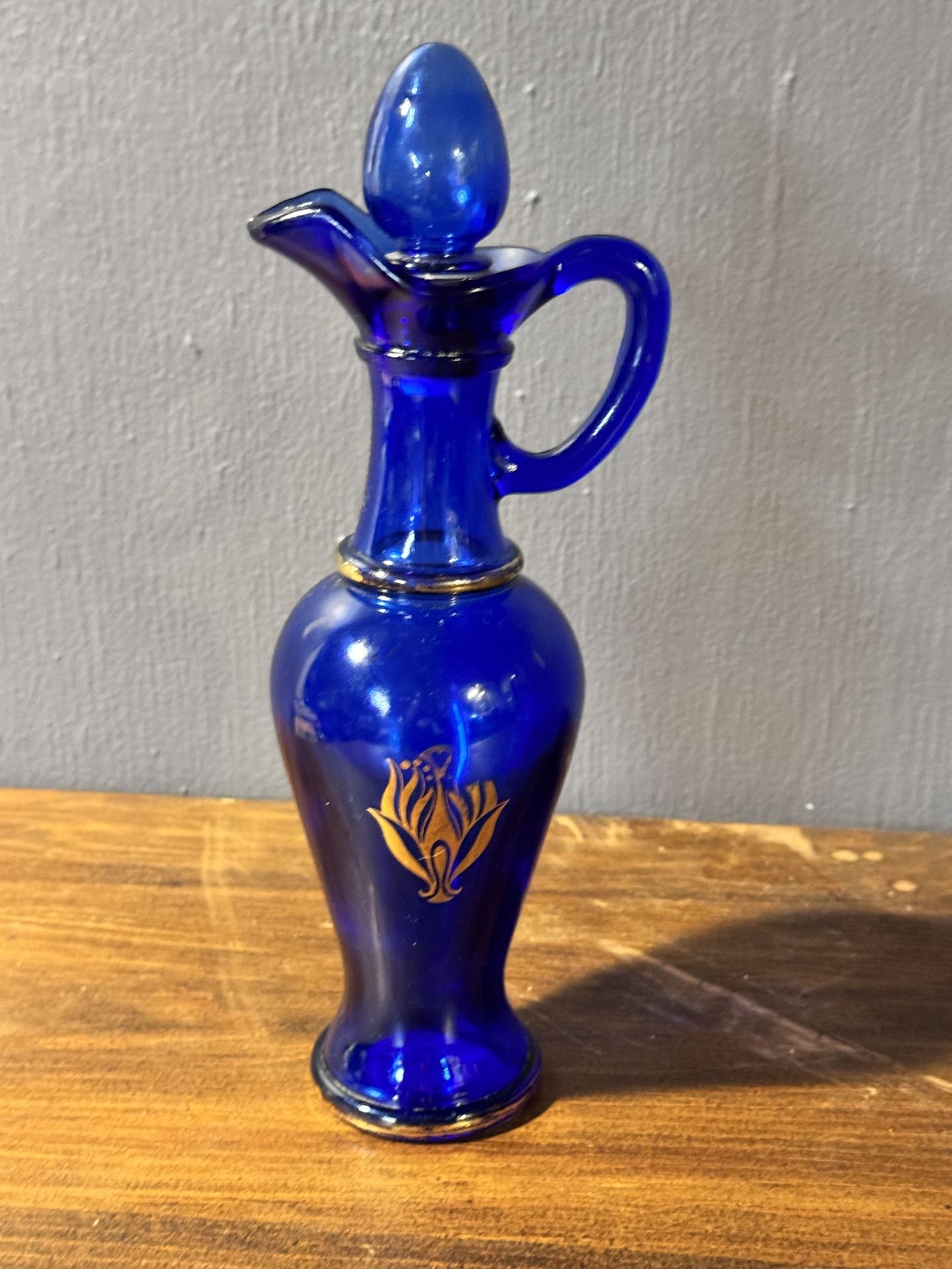 vintage Avon Skin So Soft Cobalt Blue Glass Decanter with Gold Accen