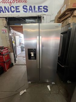 Side by side stainless steel refrigerator