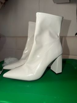 White patent leather ankle boots