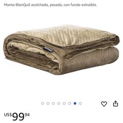 Manta BlanQuil acolchada, pesada, con funda extraíble.