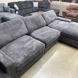 Gray Plush modular Sofa  with wide shareable chaise 127x66 seat depth 40” adjustable backs 3 piece $850 optional pieces available pick up can deliver 