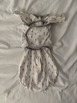$5 SwaddleDesigns Omni Swaddle Sack featuring a white fabric with a black triangular pattern