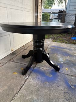 Beautiful Black Round Pedestal Table