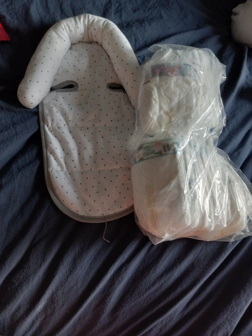 Carseat Pillow And Diapers