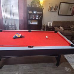 Pool Table & Cue Sticks Included