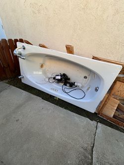 White Jetted Bathtub with Pump
