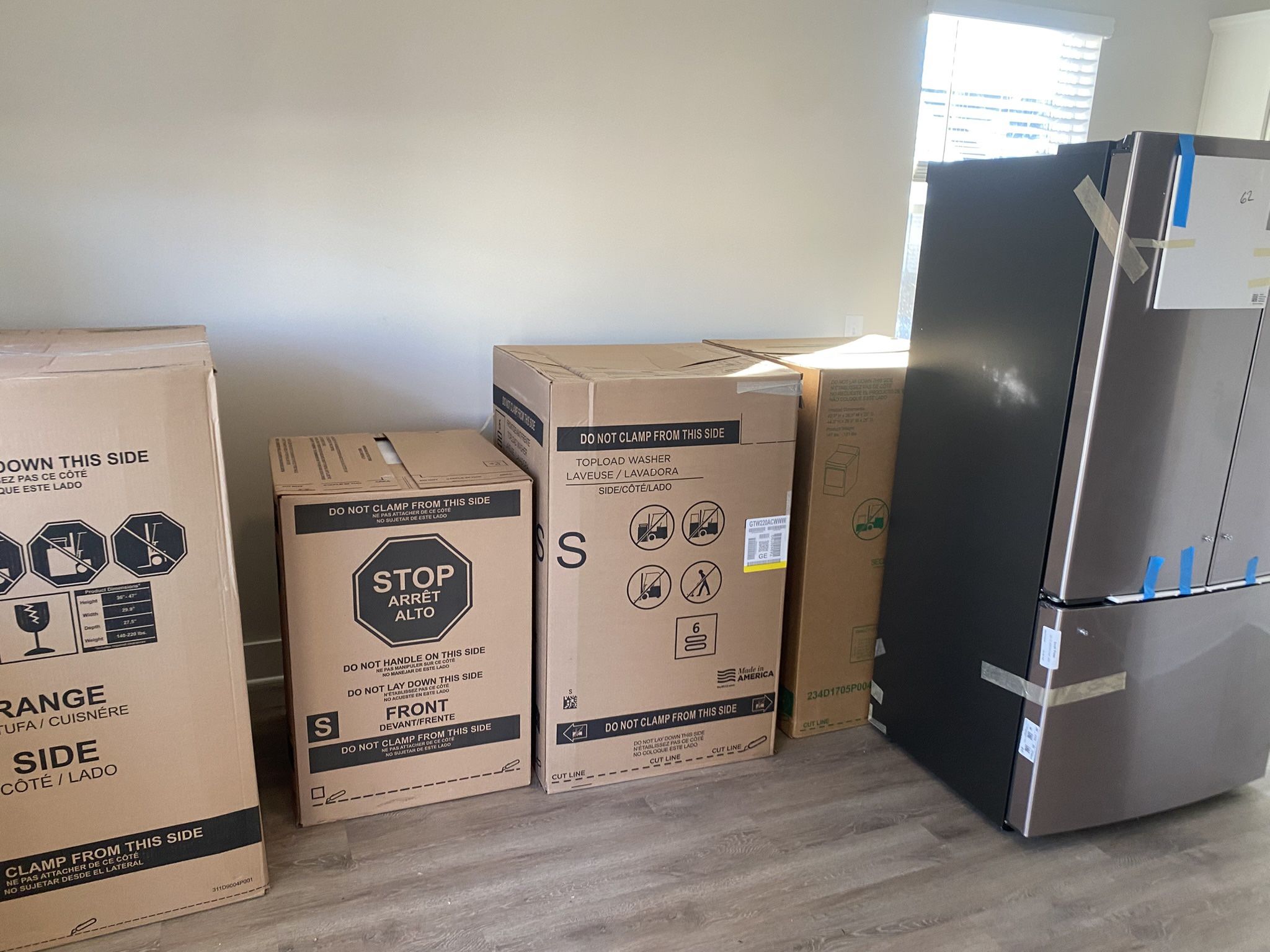 GE Stainless Steel Kitchen Appliances with Washer/Dryer Set