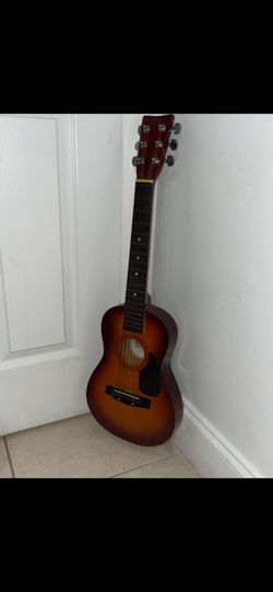 Sunburst First Act acoustic guitar