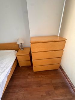 Full-size bed in walnut