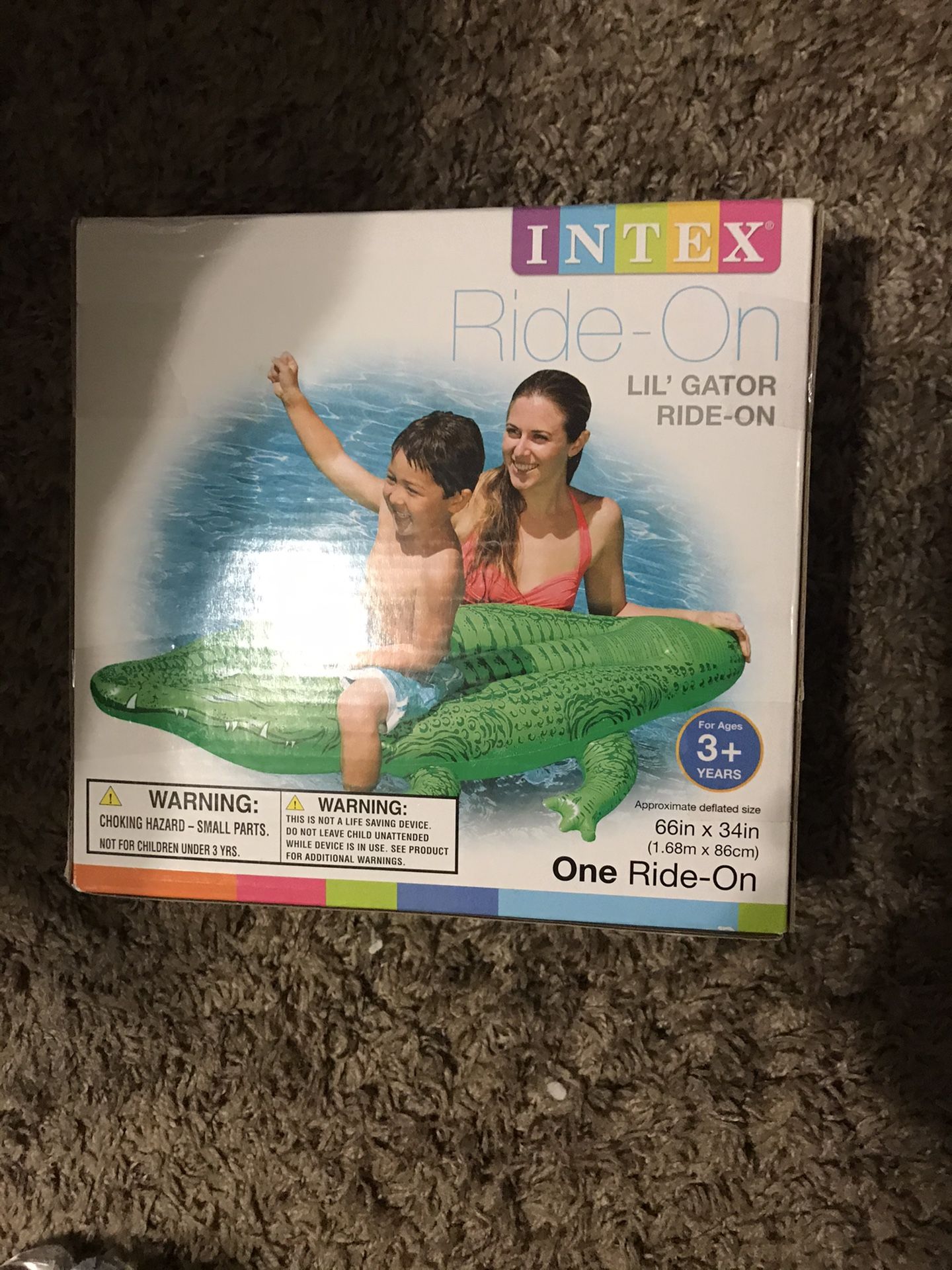 Brand new Ride-on lil, Gator $15 another TRANSPARENT Mat$7 and H2oGO!Frosted Neon Swim Ring$6 All 25