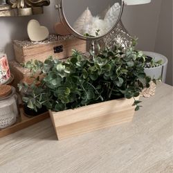 Faux eucalyptus in woodbox decor