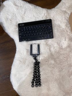Blue tooth keyboard and phone holder