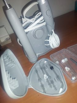 Water Pik And Battery Operated Tooth Rush