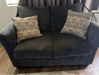 Mid-size blue/gray loveseat