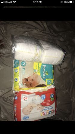 3 PACKS OF NEWBORN DIAPERS