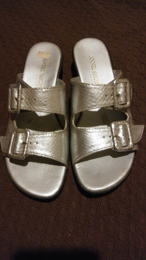 CUTE SILVER SANDALS WITH BUCKLE ACCENTS BY ANNIE SHOES, SIZE 6. MUST PICK UP PLEASE. THANK YOU!