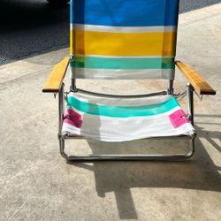 Two adjustable low setting chairs excellent condition One Not In Photo