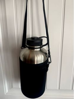 64 ounce stainless steel water bottle with carrying strap (new)