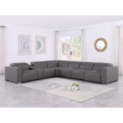 New 7 PC / 4 PWR Reclining Sectional.  Genuine Leather.  147x130x31H.  Free Delivery!