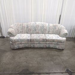 Floral Pattern Skirted Upholstered Couch with Rolled Arms