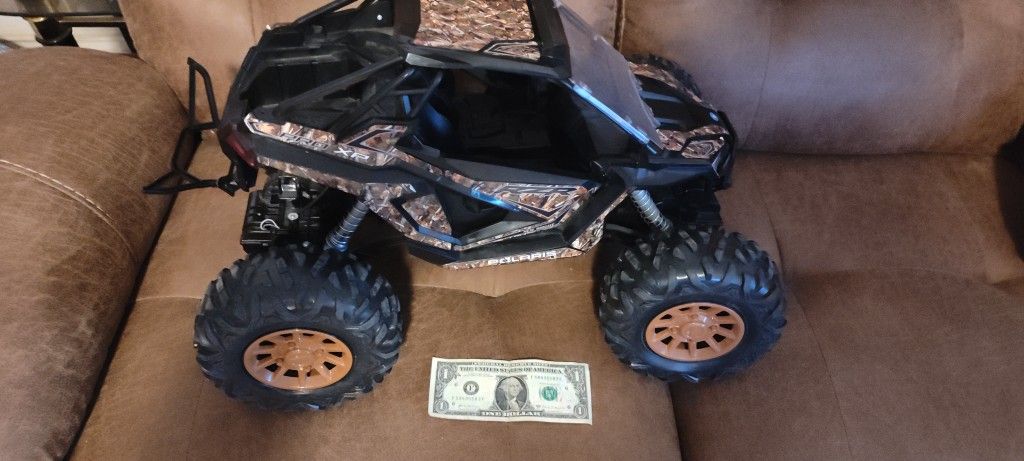 Previously Owned Plastic Polaris Quad Toy
