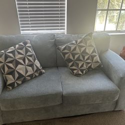 Light Blue Sofa Set with Ottoman – Great Condition