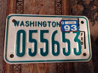 Vintage 1976/1986 Washington State motorcycle license plate, white/green