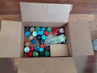 Random assortment of Bakugan (cards, Bakugan, magnetic tiles, guide)