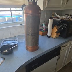 Antique fire extinguisher hose is missing