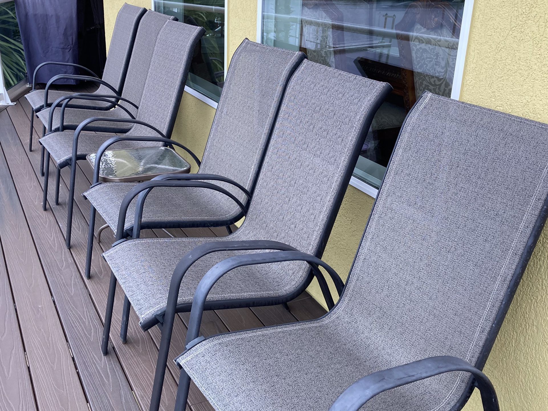 8 chairs w/small table. Great condition $15 each chair. $115 for all chairs and table