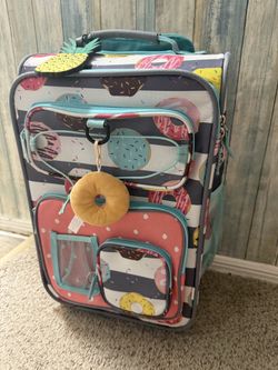 A sturdy suitcase measuring \(19x12x8  with wheels, great for carry on luggage