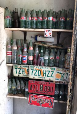 Old coke and soda bottles
