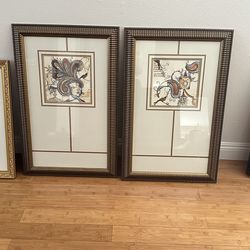 Wall art: 2 identical frames with different but “similar theme” pictures