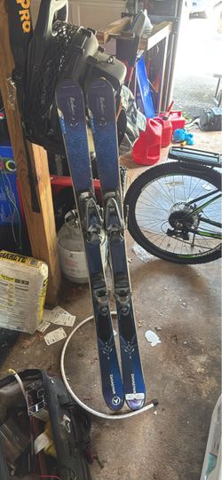 Dynastar downhill skis with bindings.