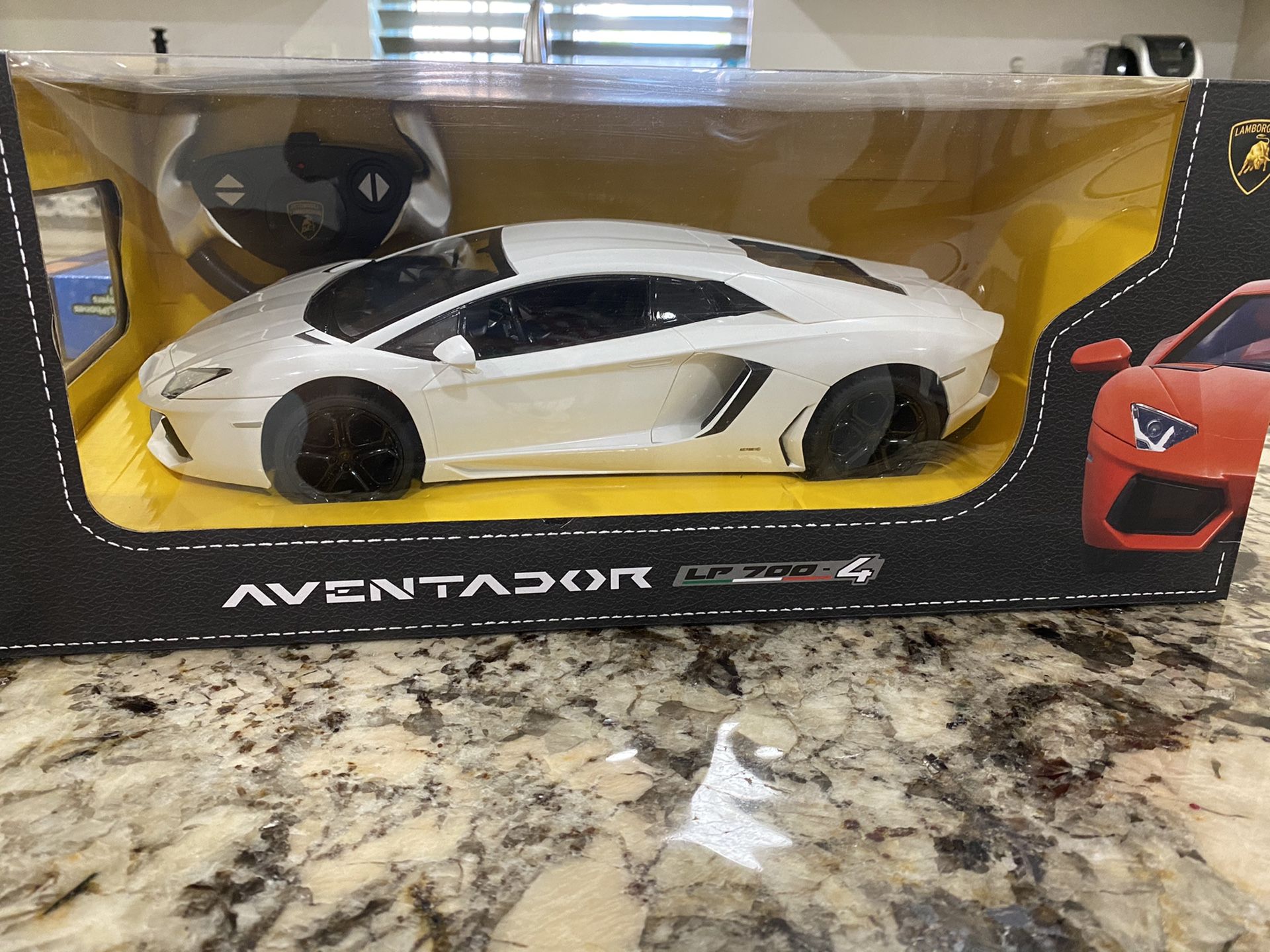 Brand new RC cars this is a Lamborghini white on black it’s just eye catching these sell for $80 at the mall I have them for $35