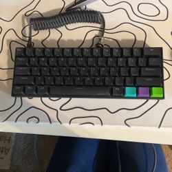 Anne pro 2 gaming keyboard with custom key caps