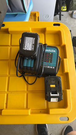 Makita Charger and two 18v Batteries