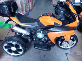 Kids ride on motorcycle