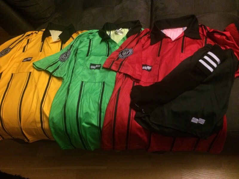 Soccer referee uniform and extra shirts