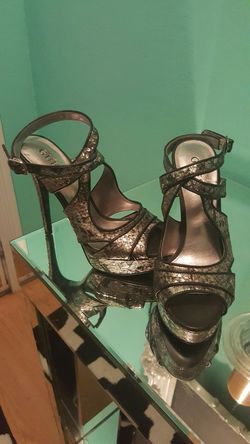 Guess silver/black high heels..5 inch heel...Great condition!..size 6 womens