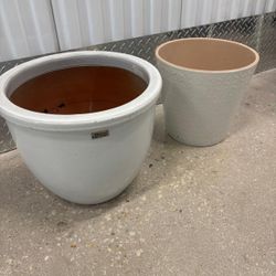 Two Michael Carr designs ceramic pots with holes .  16” round x 13”    $60 for both