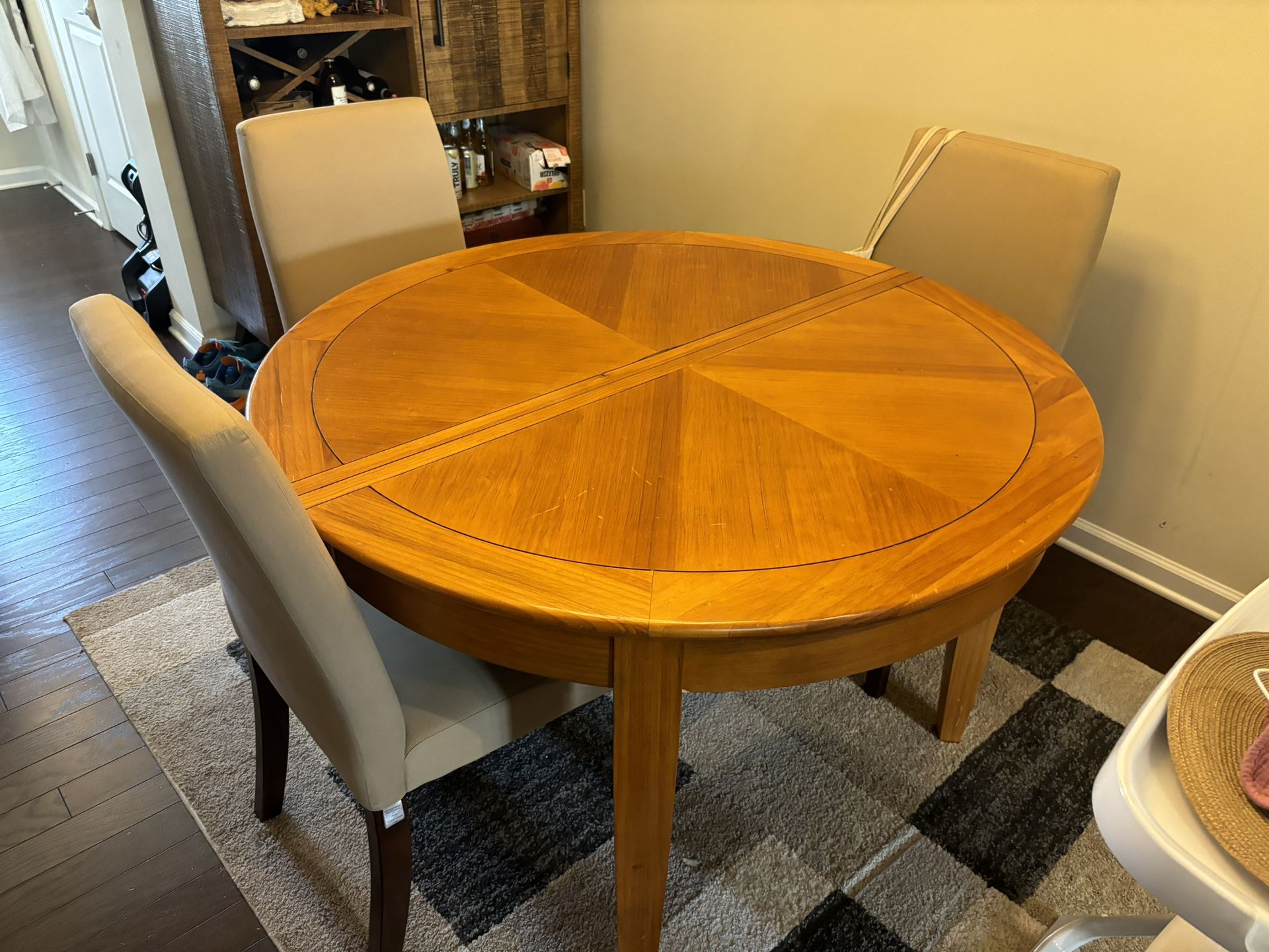 Wooden kitchen table, convertible circle to oval