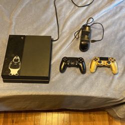 PS4 With Two Controllers And Charging Dock