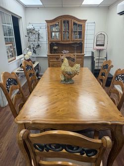 Dining room table 6 chairs and curio cabinet