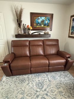 Mocha Brown Leather Reclining Sofa – $550